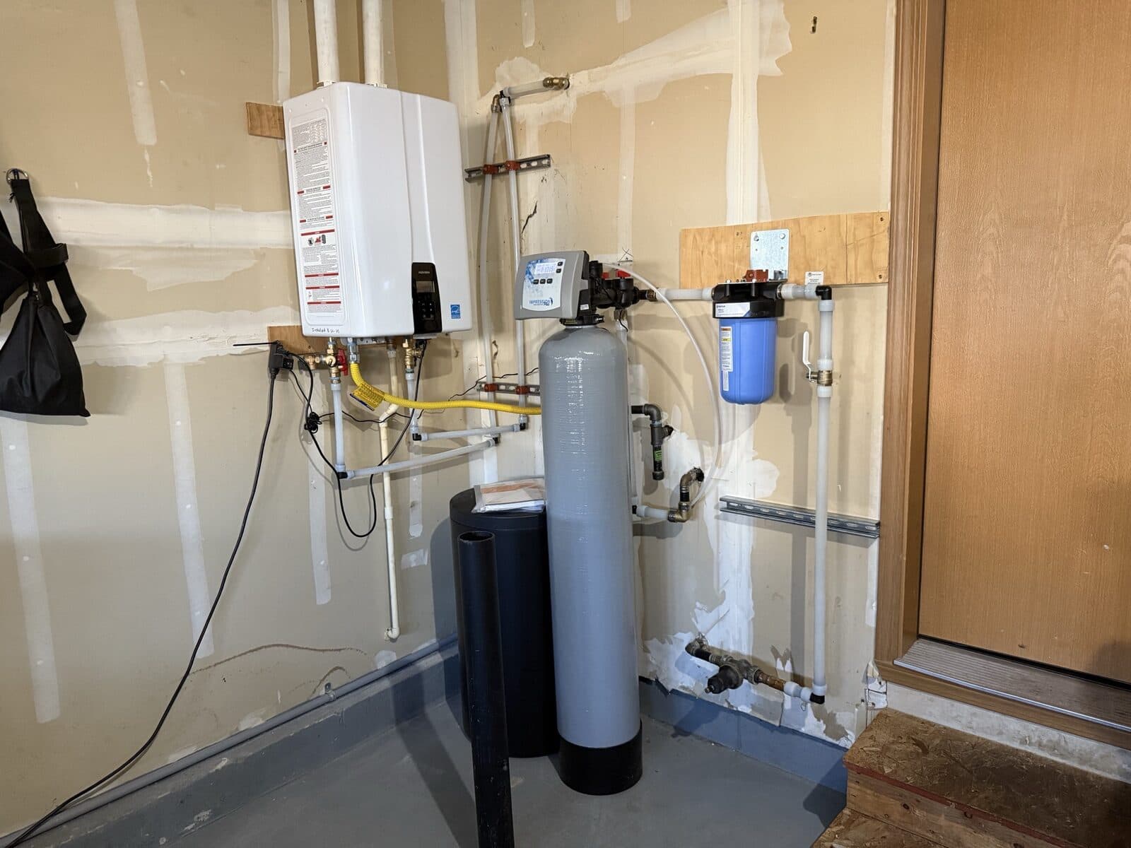 Indoor heater and filtration stack installed in a Diamond Bar utility room