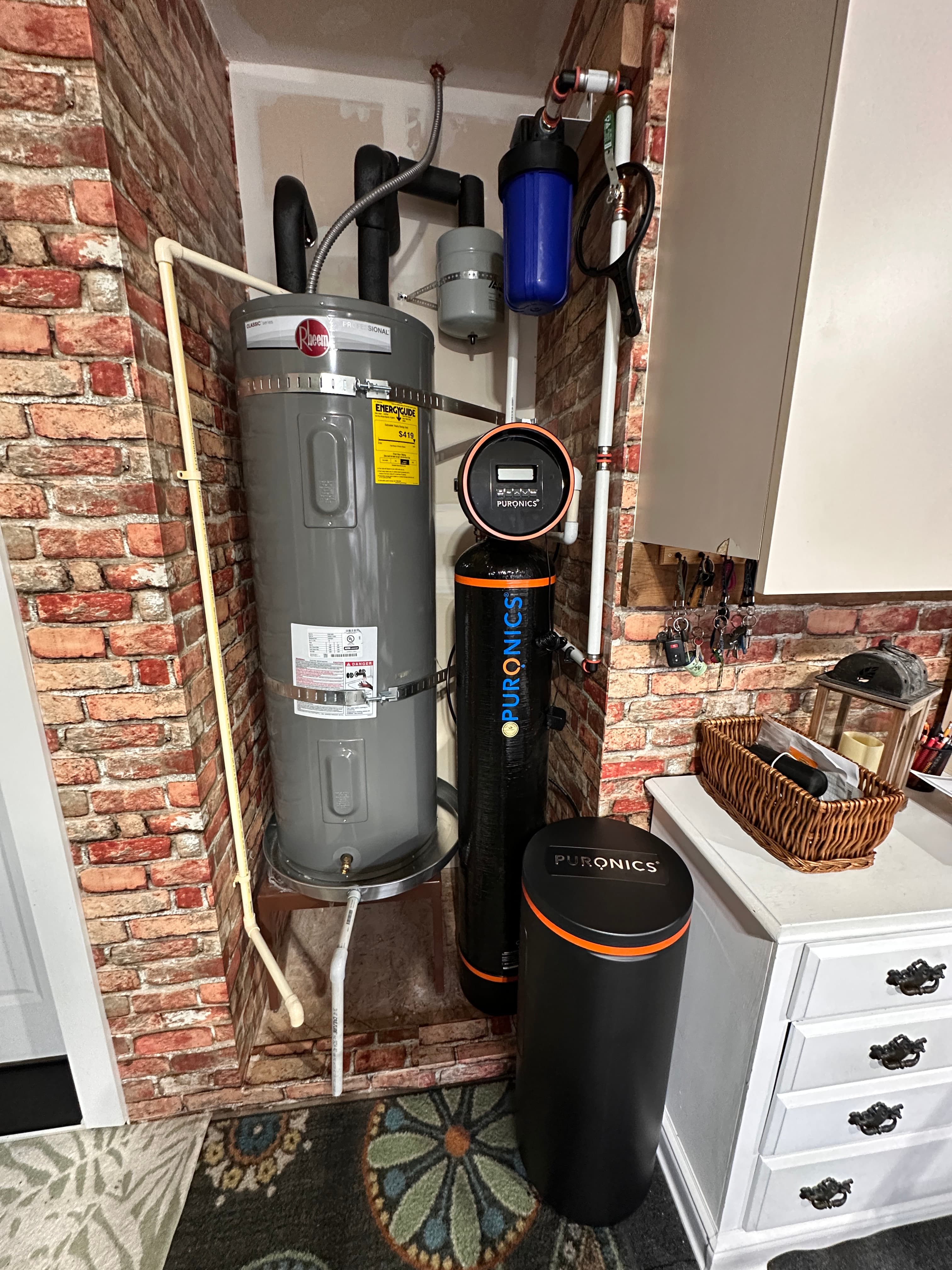 Compact whole-home system fitted into a tight Chino Hills utility closet