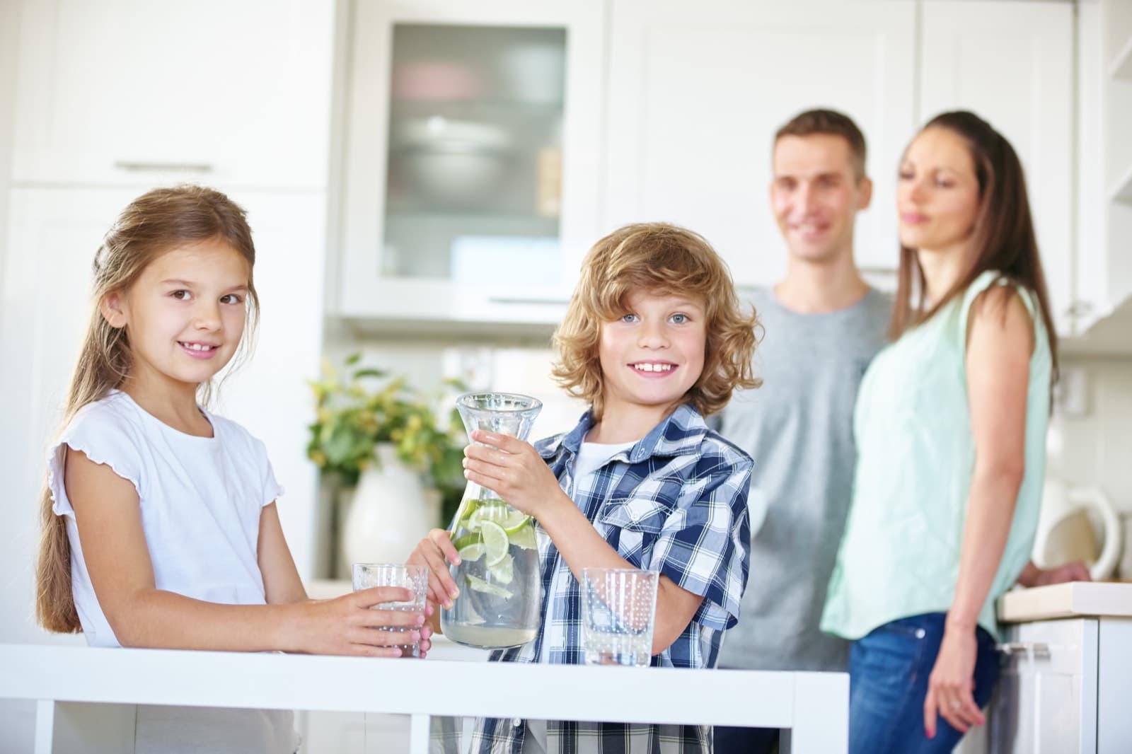Tustin family in the kitchen after their whole-home water filtration install