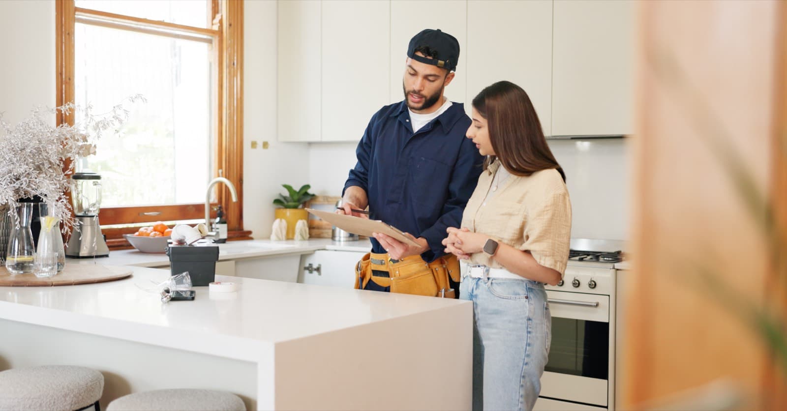 Technician walking a SoCal homeowner through the free water test results