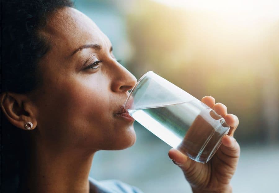 Woman drinking filtered water